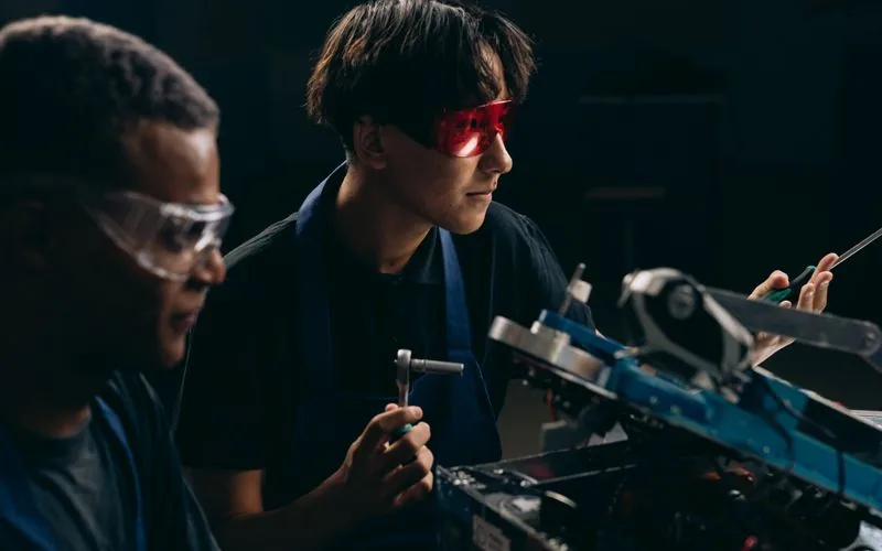 Research and development β engineer working on industrial machine